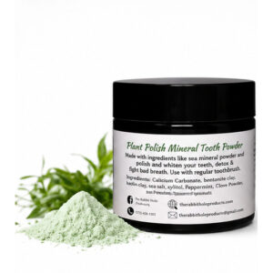 Natural mineral tooth powder in dark jar with green powder and mint leaves by Rabbit Hole Products
